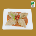 Mushroom Momos in Manchurian Sauce