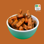 Carrot pickle in small white bowl